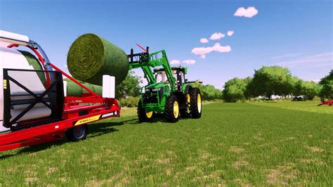 This only takes 5 seconds to wrap a bale, so it's . . Fast bale wrapper fs22